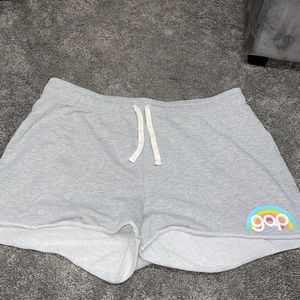 grey comfy shorts with rainbow and gap lettering